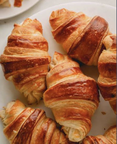 Freshly baked golden croissants
